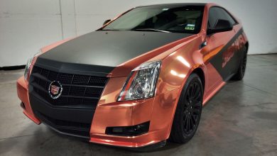 This beautiful Cadillac CTS coupe was given a custom wrap using Avery Gold Chrome conformable wrap film and Avery matte black Su