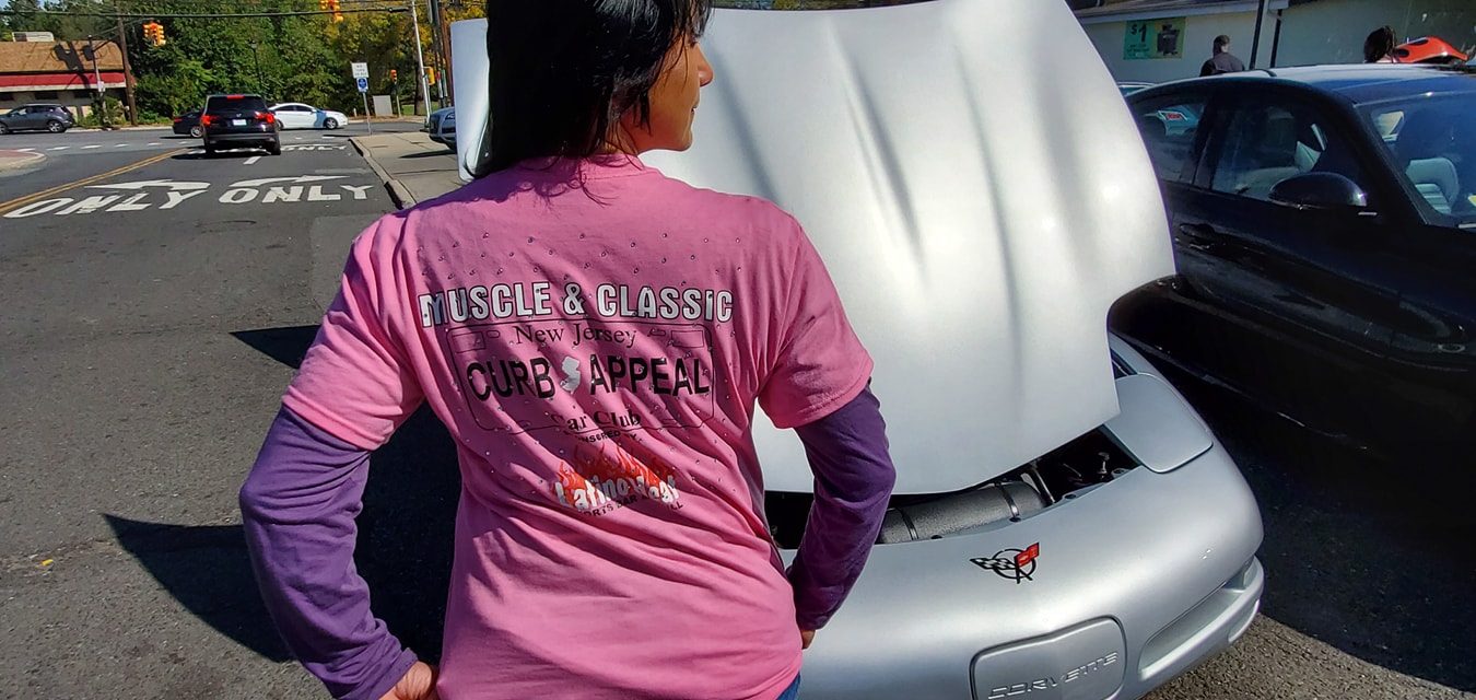 Martha Ray modeling the Curb Appeal Car Club t-shirt. 