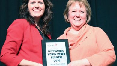York News-Times Woman-Owned Business Award from York Chamber of Commerce President Carrie Colburn Gina Schoch