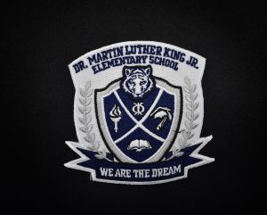 World Emblem Martin Luther King School Crest