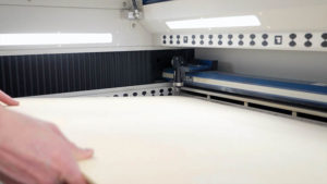 3 loading plywood into laser machine