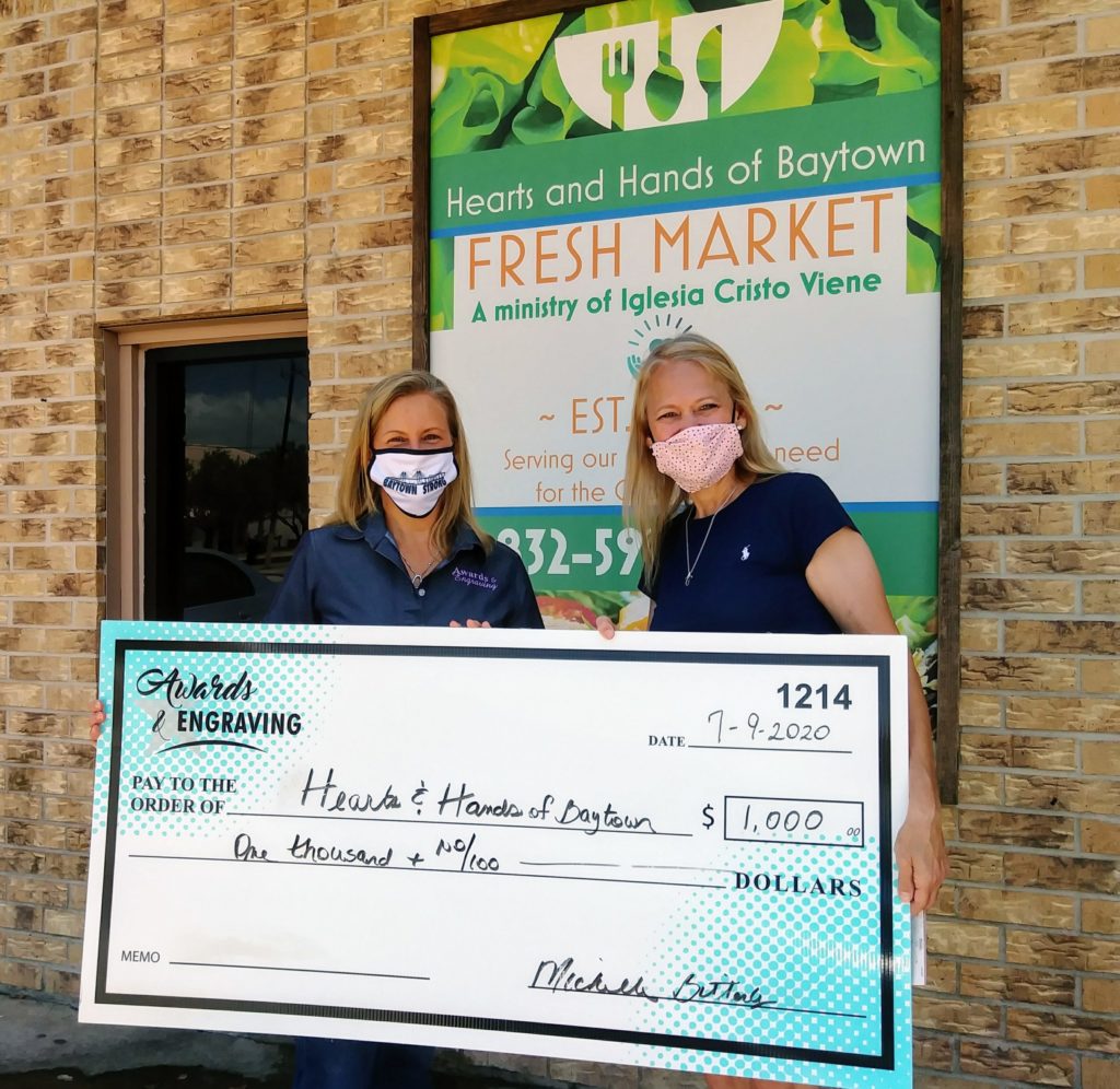 Texas Awards Shop Presents Local Food Pantry with 1K Check GRAPHICS PRO
