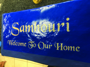 A painted, sandcarved sign