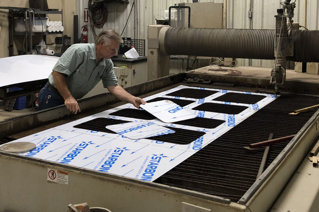 Our old waterjet was used to cut the parts of this monument sign, starting with the sub panels that define the sign’s shape and internal frame.