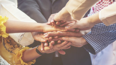 Group of people diversity multiethnic teamwork collaboration tea