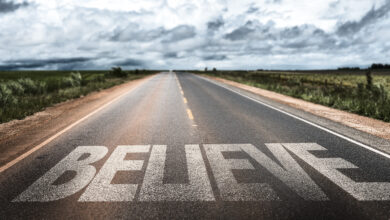 Believe written on rural road