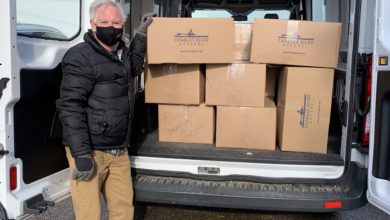 Volunteer Greg Reardon picks up CRA boxes in Dec 2021
