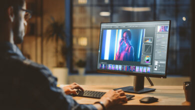person editing image in photoshop