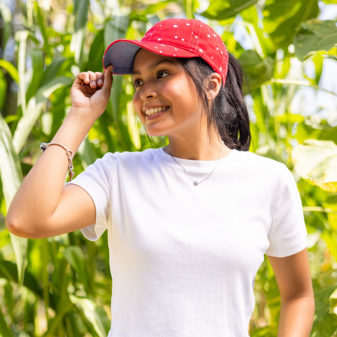 woman wearing red Infinity Her cap