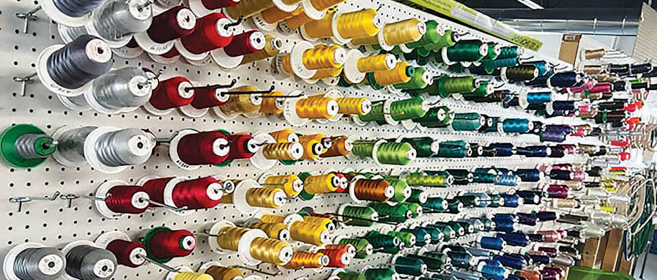 wall of embroidery threads