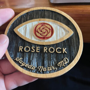 Sandcarved wood coaster