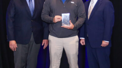 Zach Finch, TRG sales representative, receives the award from Peter DelGado, IAPD past president (left), and Jim Richards, IAPD president (right). (Photo credit IAPD) rowmark