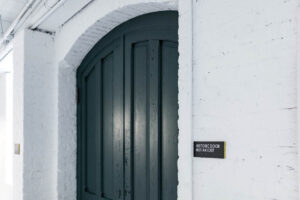 Historic door sign. Photo taken by Megan Morales