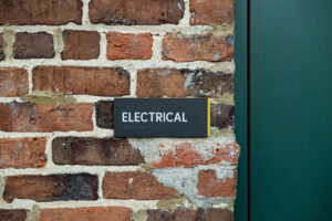 Permanent room sign. Photo taken by Megan Morales