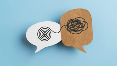 Mental health, brain disorder, World mental health day, Alzheimer, Psychology concept. Tangle of thoughts and clear line on real brown and white speech bubble paper cut with blue background, busy season