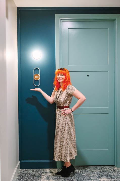 Lauren Stern with a Unit Sign Photo Taken by Megan Morales