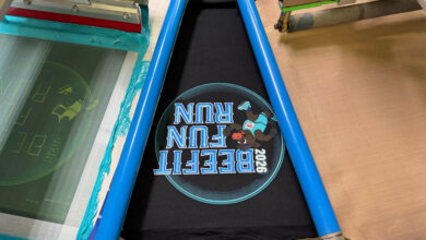 CattleCon tee being screen printed
