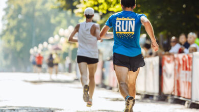Athletes run in the park on the running marathon - on demand printing event merch