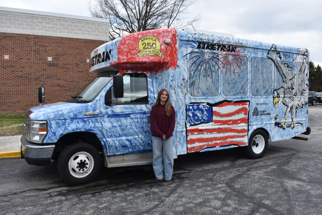Image 1 Riverside Sophomore Ava Passalacqua with 2026 winnng Art Bus Design