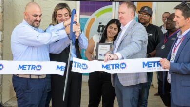 Owners Nasmah Alsalihi and Houmam Al-Shalchi take part in a ribbon cutting to celebrate the new location of their business Image360 San Antonio.