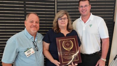 Minuteman Press Bradenton FL Presidents Club Award - Justin and Christy Phillips with Nick Titus - Landscape copy