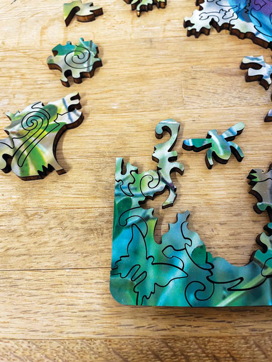 Mumm Curiosity Puzzle Company close up pieces
