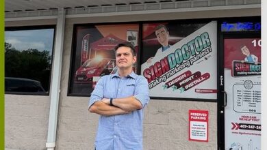 Marco Milliotti in front of Sign Doctor shop