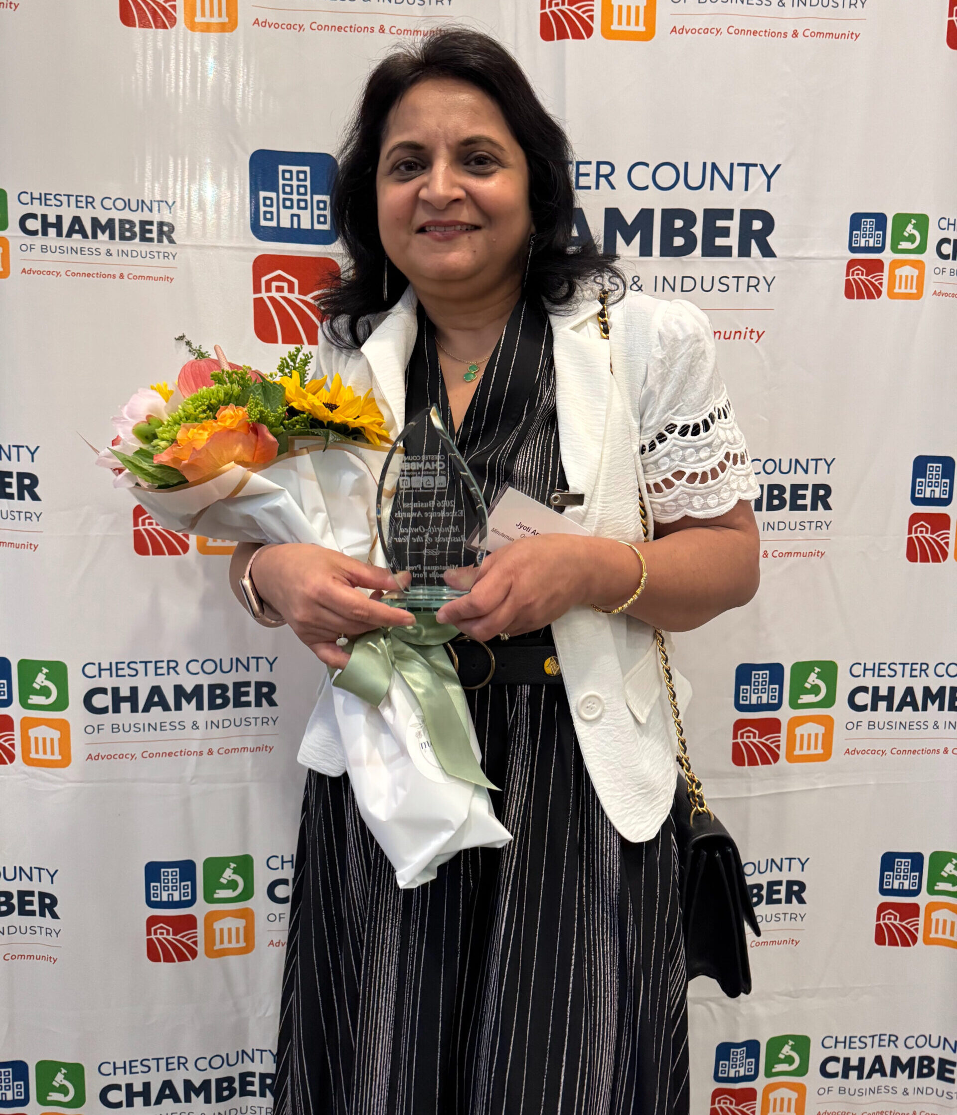 Jyoti Arora, Owner of Minuteman Press in Chadds Ford PA, accepts the award for Minority Business of the Year at the CCCBI Awards Dinner