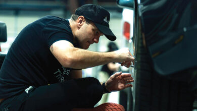 Here John Duever demonstrates the trimming technique during a PrismaPro dry-apply color paint protection film wrapping class.