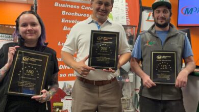 Minuteman Press Franchise Owner & President’s Club Member Abel Corral (center) with team members Mariah (left) and Jesse (right) in Denver, CO.